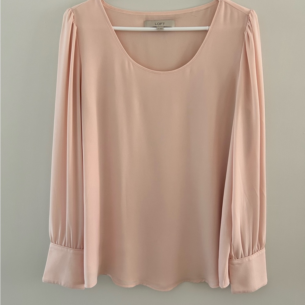 Pale pink long sleeve blouse with pearl buttons